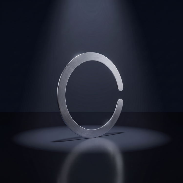 Magnetik magnetic ring in silver under a spotlight