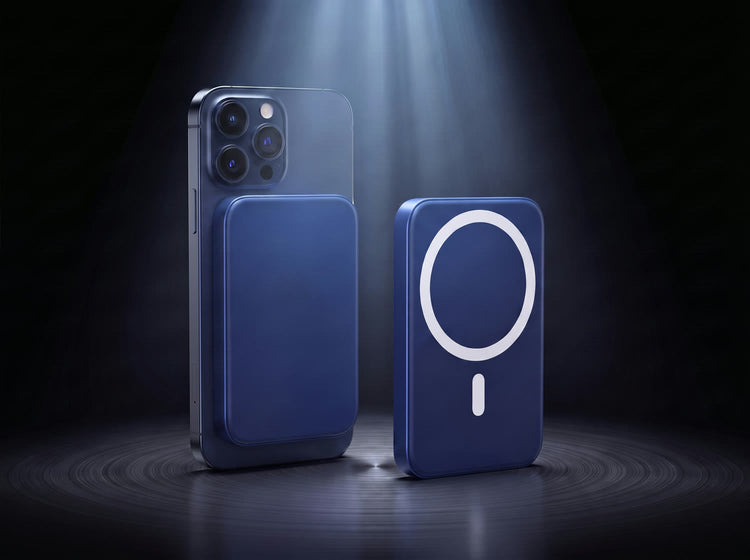 Magnetik power bank in royal blue attached to a phone, with a second unit showing its magnetic ring