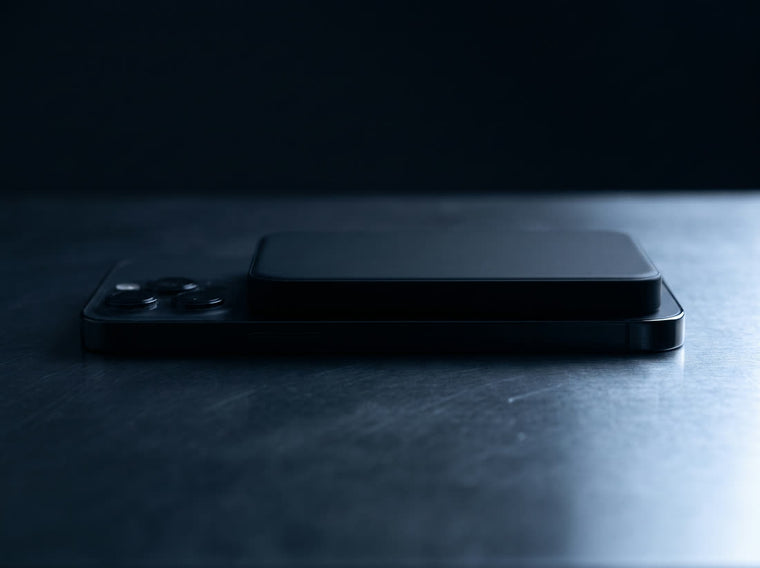 Side on view showing the power bank is about as thick as two stacked cards